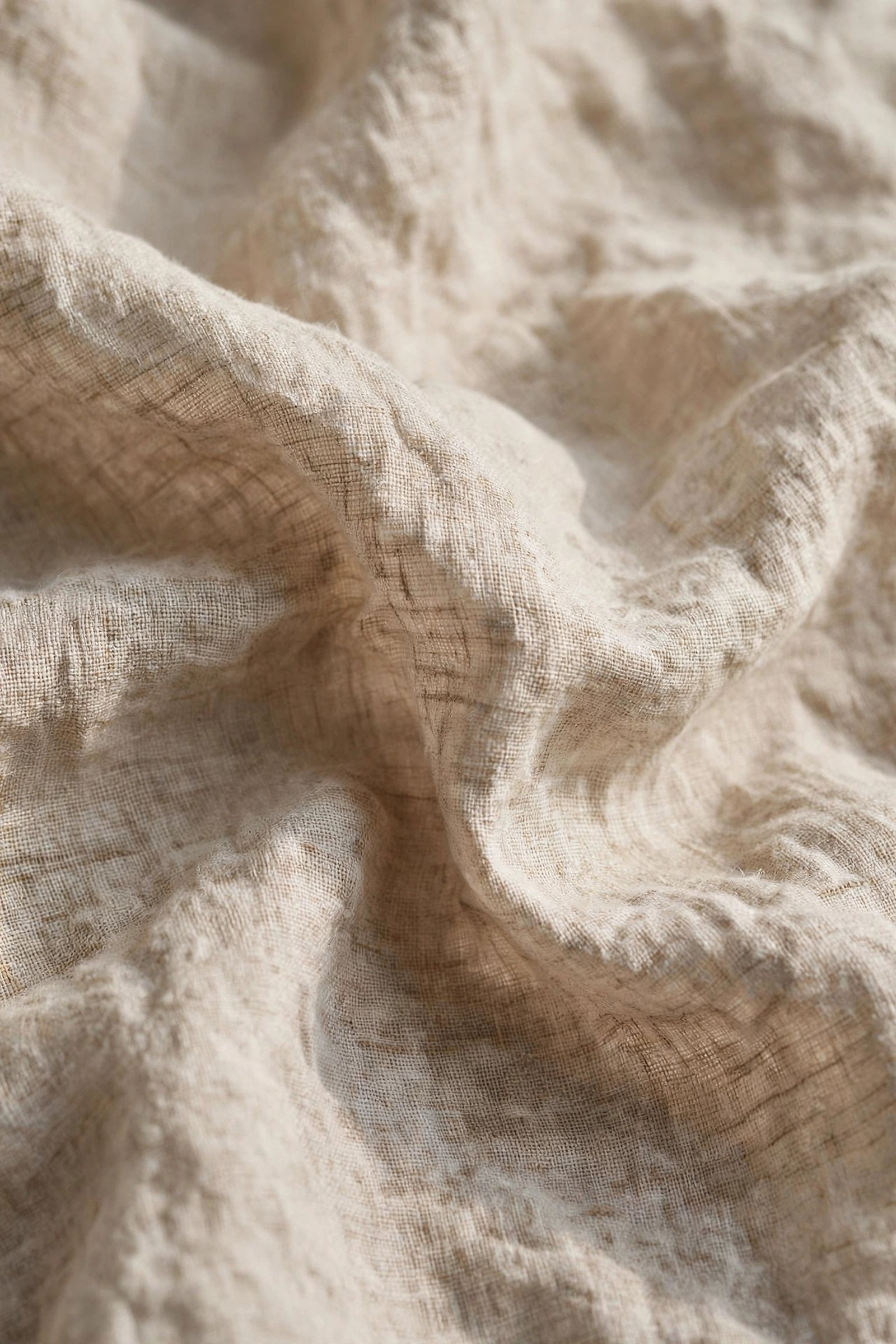  "Natural beige linen fabric with visible woven threads"